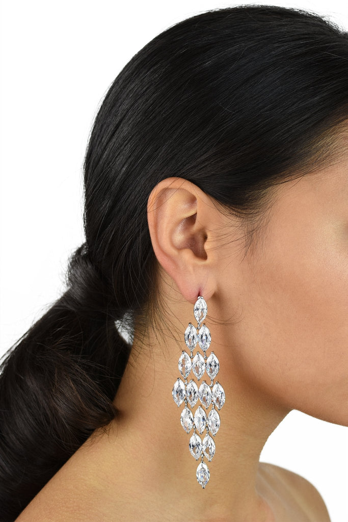 Long Bridal Earrings with Zirconia stones shown on a dark haired Bride