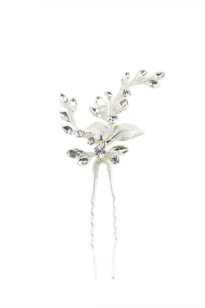 A silver hairpin with crystals shown on a white background