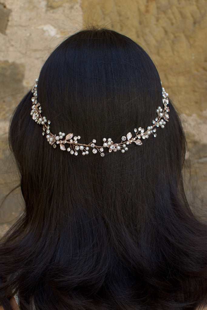 Rose Gold Vine with crystals and pearls on the back of the head of a dark hair model