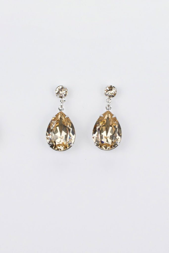Silver earring with a silk colour pear shape stone